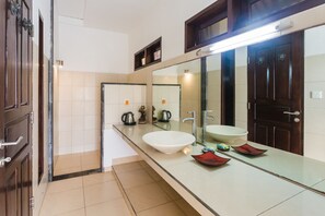 Shower, rainfall showerhead, hair dryer, towels