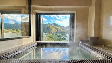 Separate tub and shower, free toiletries, hair dryer, slippers