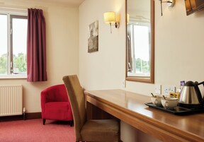 Twin Room | Desk, blackout drapes, iron/ironing board, free cribs/infant beds