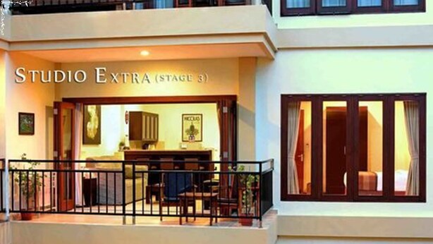 A hotel entrance with a sign reading "STUDIO EXTRA (STAGE 3)". - Kuta Townhouse Apartments (Kuta)