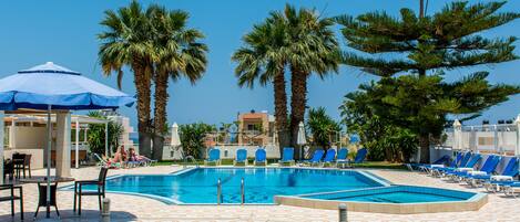 Outdoor pool, open 8:30 AM to 8:00 PM, pool umbrellas, sun loungers