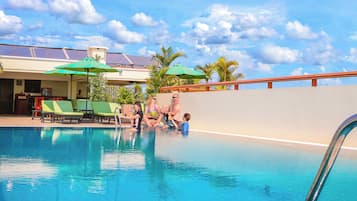 Outdoor pool, open 10:00 AM to 9 PM, pool umbrellas, sun loungers