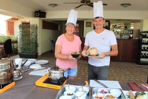 Lunch, dinner served; international cuisine, pool views 