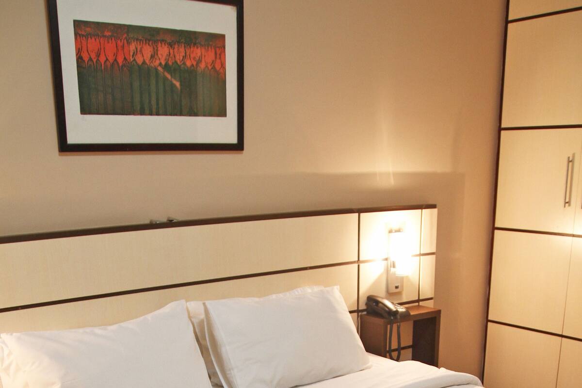 Deluxe Double Room | Minibar, in-room safe, individually furnished, desk