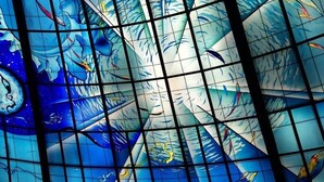 A stained glass window with geometric patterns and abstract designs. - Chao She Hotel (Kaohsiung)