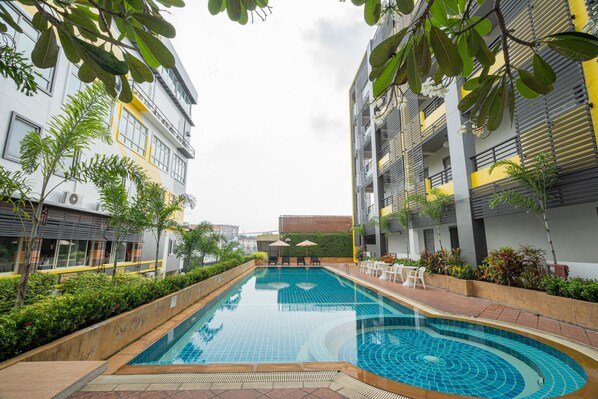 Outdoor pool, pool umbrellas, pool loungers