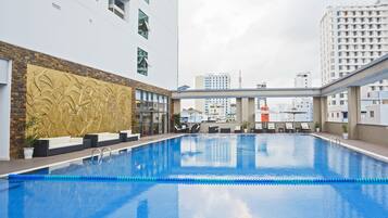 Outdoor pool, pool umbrellas, pool loungers