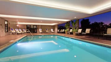 Outdoor pool, open 8:00 AM to 8:00 PM, pool umbrellas, pool loungers