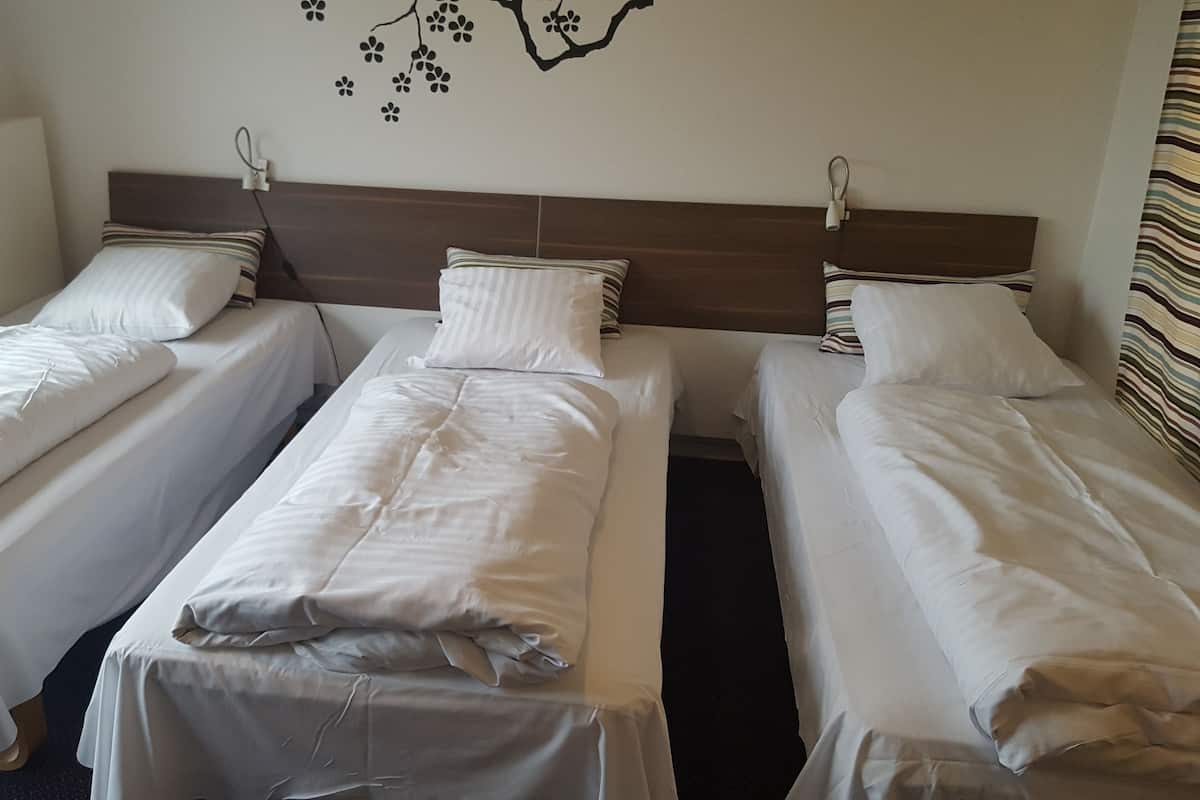 Habitación triple | 1 habitación, escritorio, insonorización y cunas gratuitas