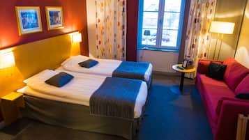 Habitación familiar | Ropa de cama de alta calidad y minibar