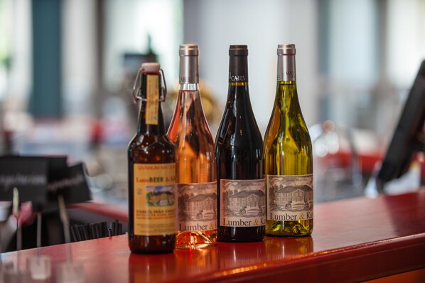A selection of wine bottles on a bar counter.