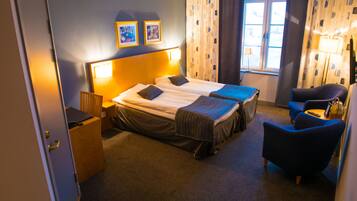 Dubbelrum eller tvåbäddsrum | Sängtillbehör av högsta kvalitet och minibar