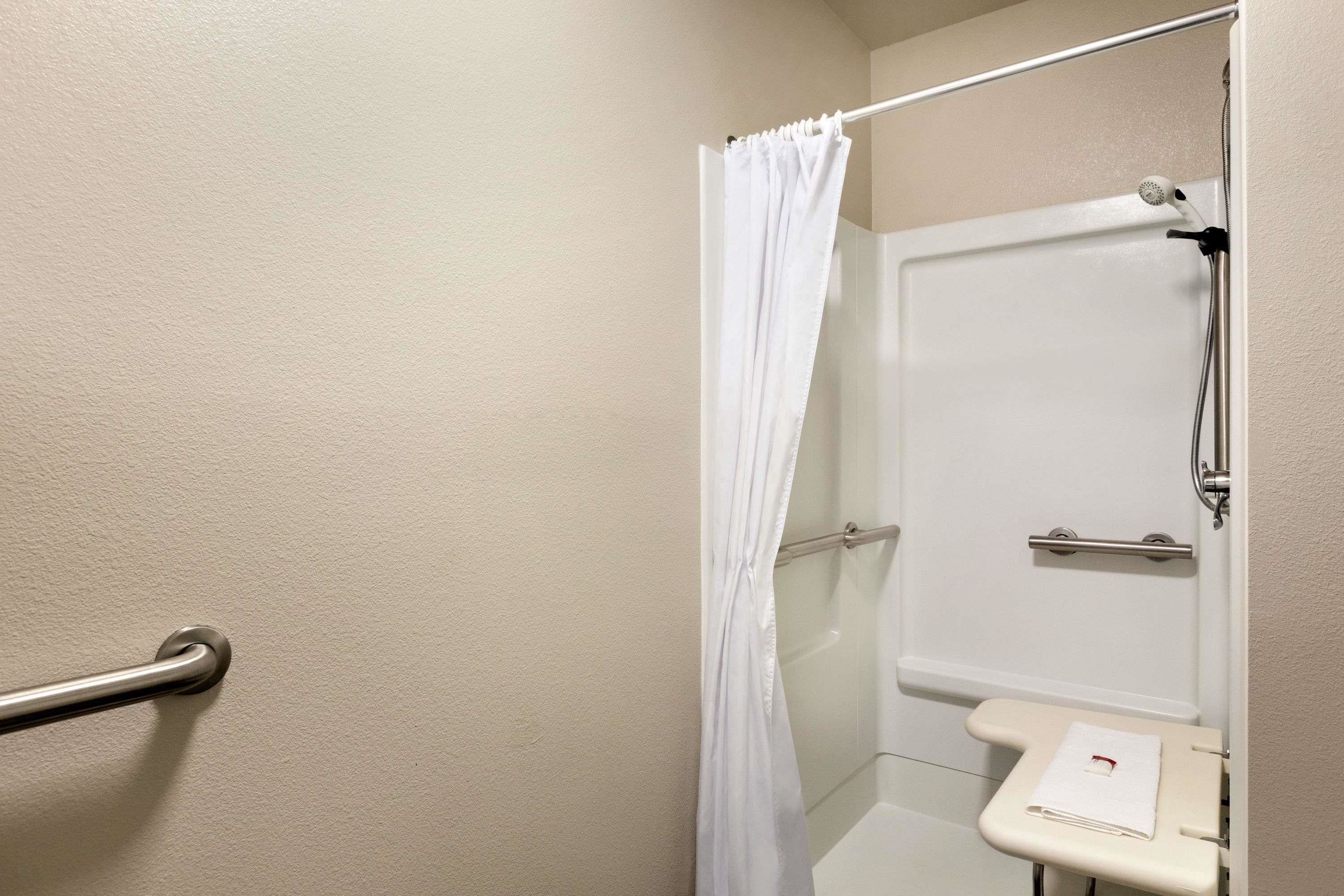 combined shower/bathtub, free toiletries, hair dryer, towels