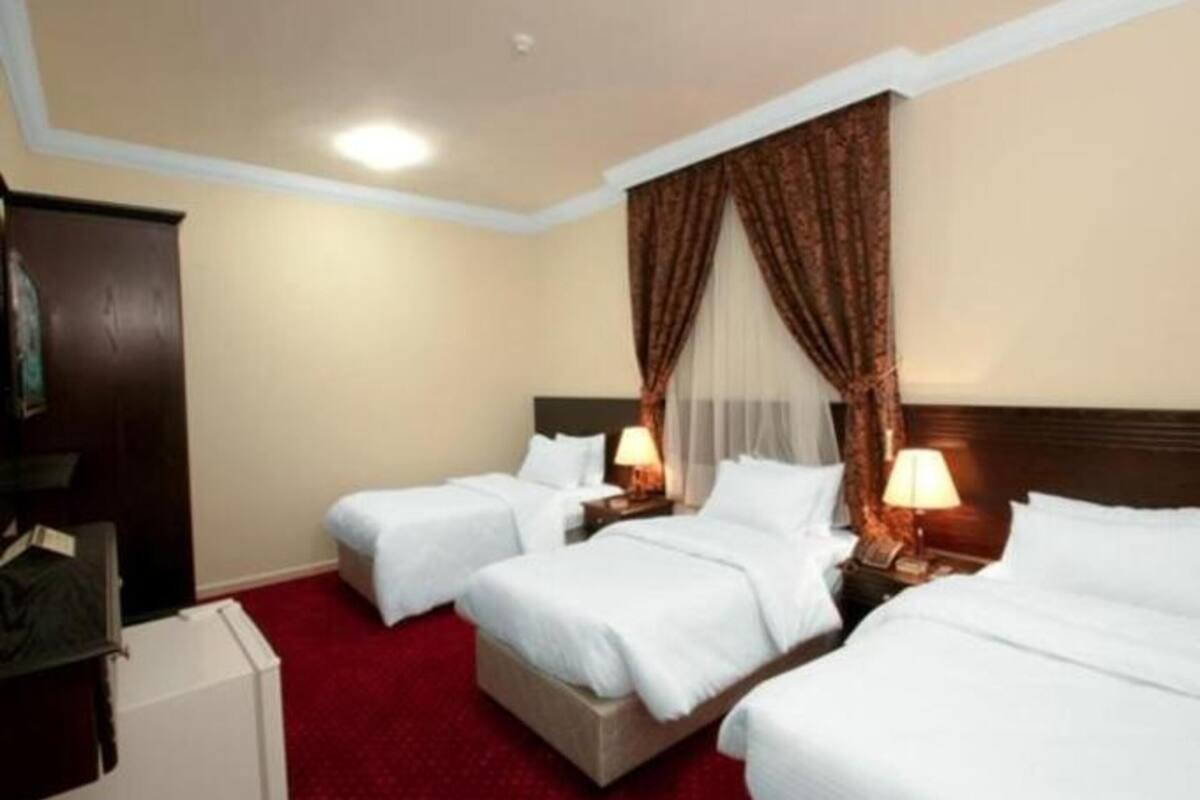 Quadruple Room | Tilam berlapik, langsir/tirai gelap terus, Wi-fi percuma, cadar katil 