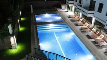 Outdoor pool, pool umbrellas, pool loungers
