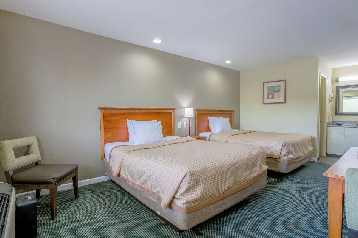Room, 2 Queen Beds, Non Smoking | Desk, iron/ironing board, free cribs/infant beds, rollaway beds