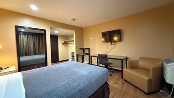 Chambre Deluxe, 1 grand lit | Espace de travail pour ordinateur portable, Wi-Fi gratuit, draps fournis