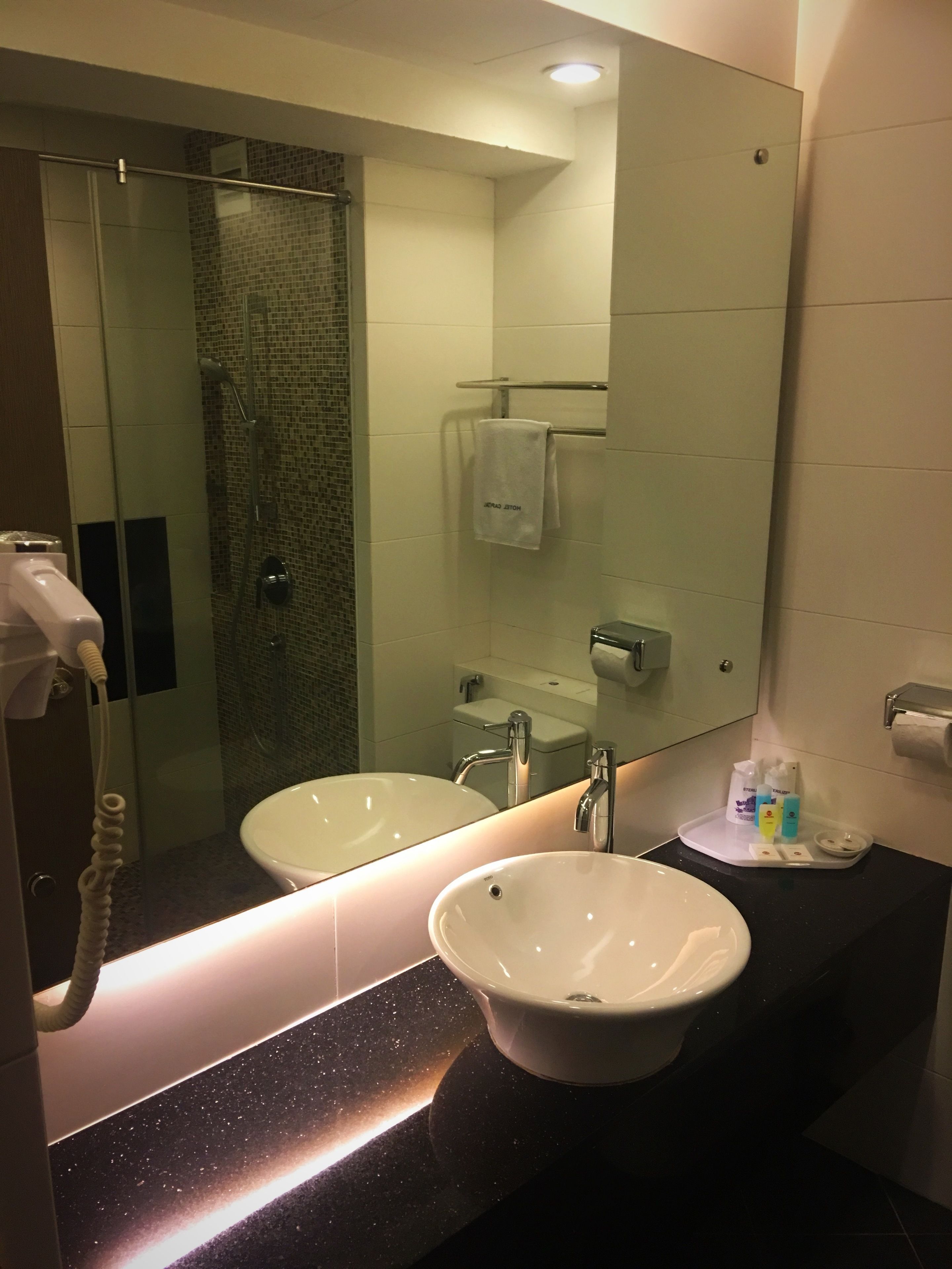 standard queen | bathroom | shower, hair dryer, slippers, towels