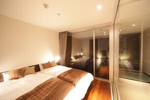 Seprai premium, minibar, brankas, dan Wi-Fi gratis