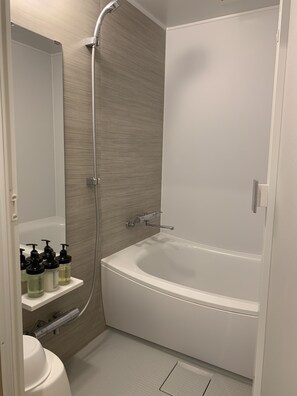 Family Room, Non Smoking | Bathroom | Combined shower/tub, deep soaking tub, free toiletries, hair dryer - On The Beach Lue (Motobu)
