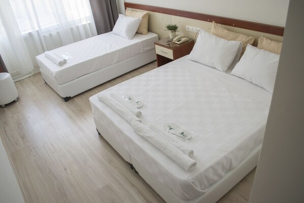 Family Room | In-room safe, free WiFi, bed sheets