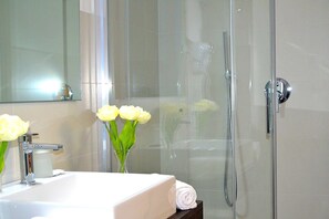 Shower, free toiletries, hair dryer, towels
