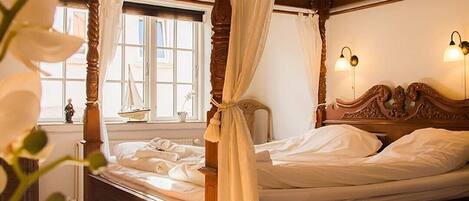 Habitación triple Deluxe, 1 habitación, cocineta | 1 habitación, decoración personalizada y muebles diferentes