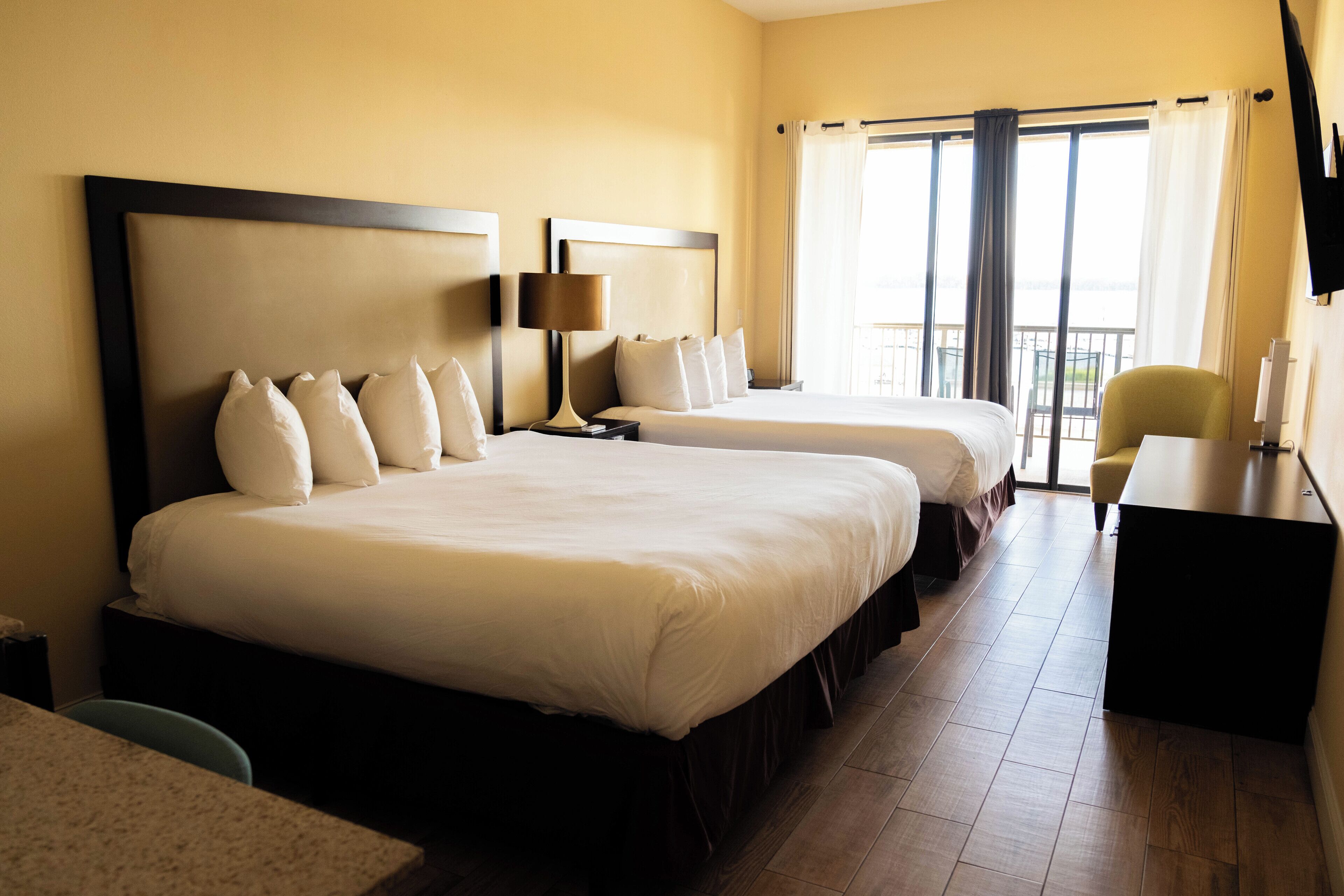 Premium bedding, desk, laptop workspace, iron/ironing board