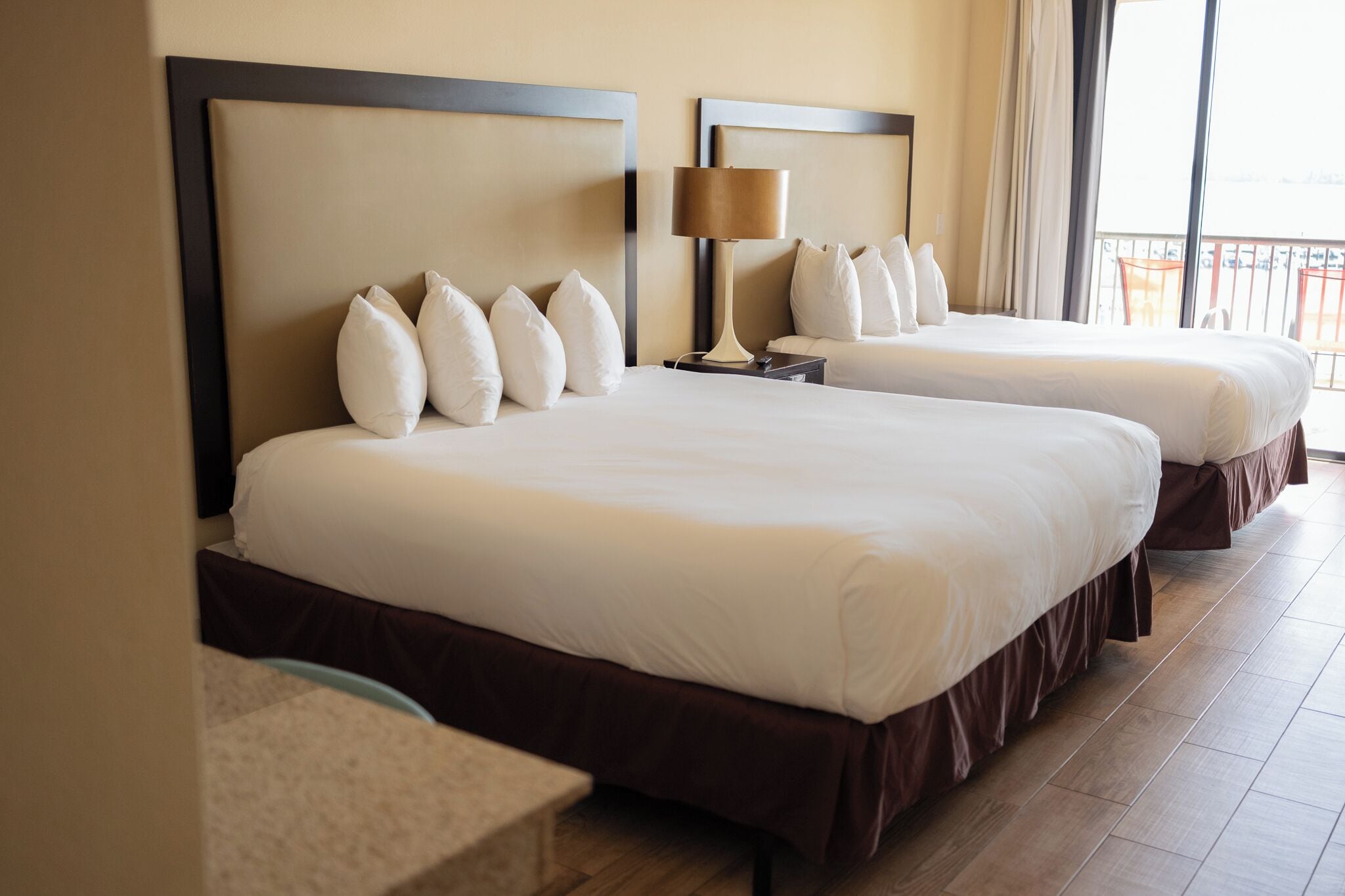 Premium bedding, desk, laptop workspace, iron/ironing board