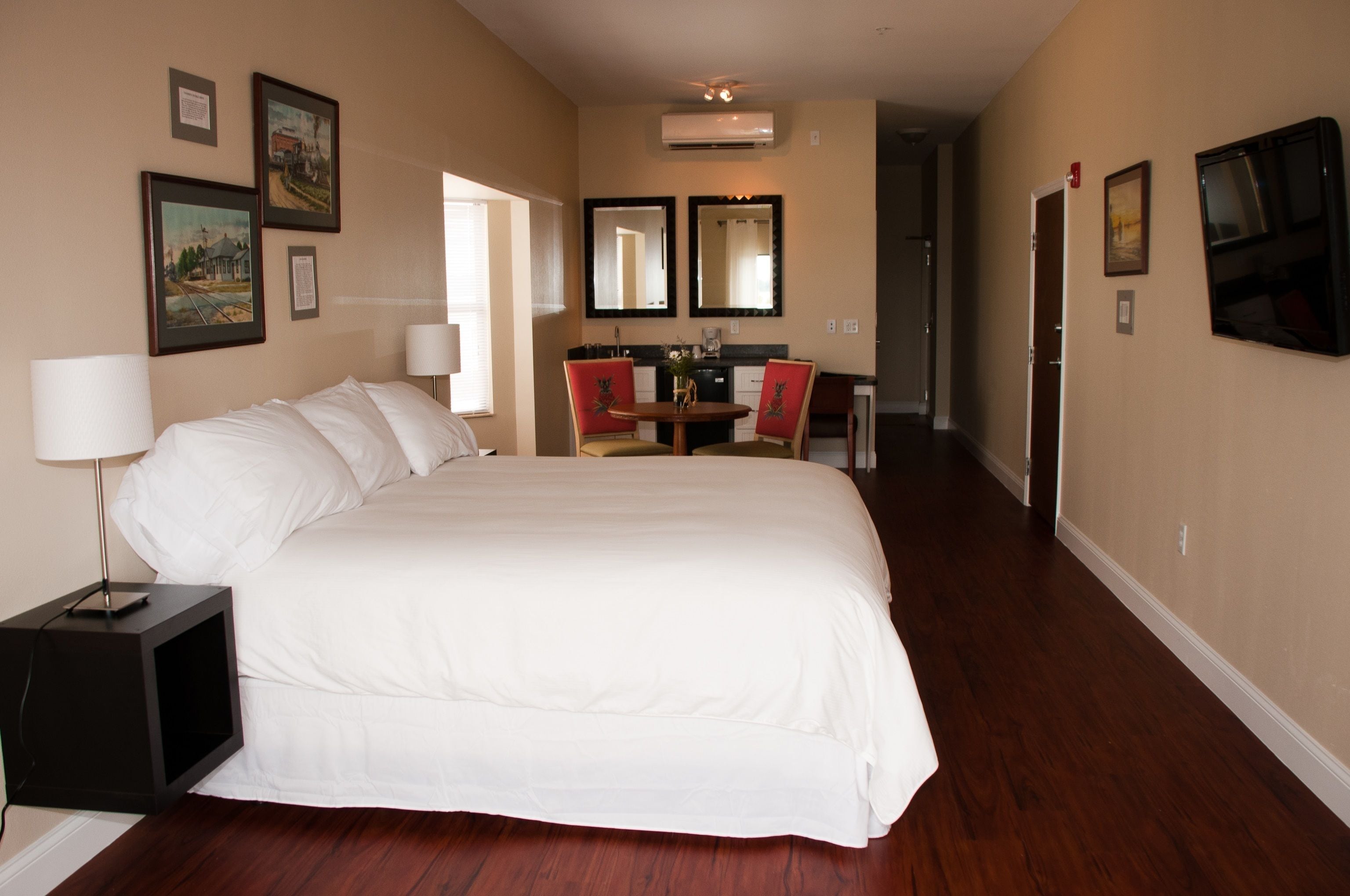 premium bedding, desk, laptop workspace, iron/ironing board