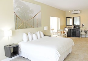 Premium bedding, desk, laptop workspace, iron/ironing board