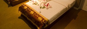 Minibar, desk, blackout curtains, iron/ironing board