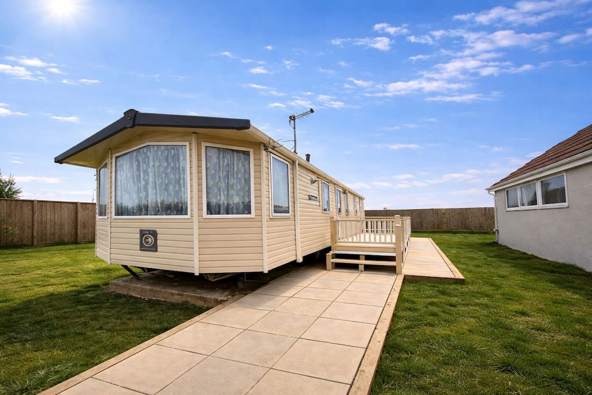 Comfort-mobile home - eget badeværelse - udsigt til have (pet friendly) | Udendørsområde