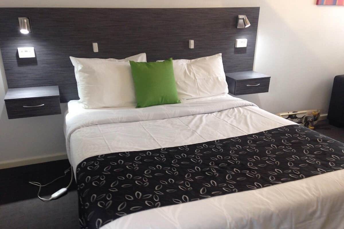 Quarto elite | Cortinas blackout, Wi-Fi de cortesia, roupa de cama