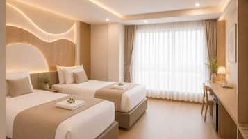 A hotel room with two beds, a desk, and a large window with curtains.