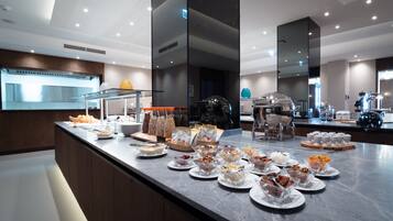 TĂ€gliches inbegriffenes FrĂŒhstĂŒcksbuffet