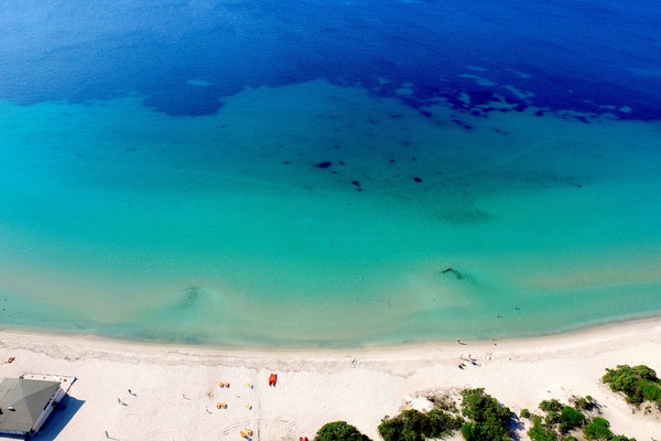 Beach nearby, white sand, sun loungers, beach umbrellas