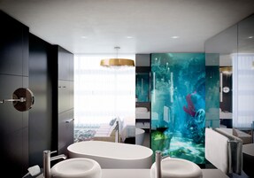 Deluxe Room, 1 King Bed | Bathroom | Rainfall showerhead, free toiletries, hair dryer, bathrobes