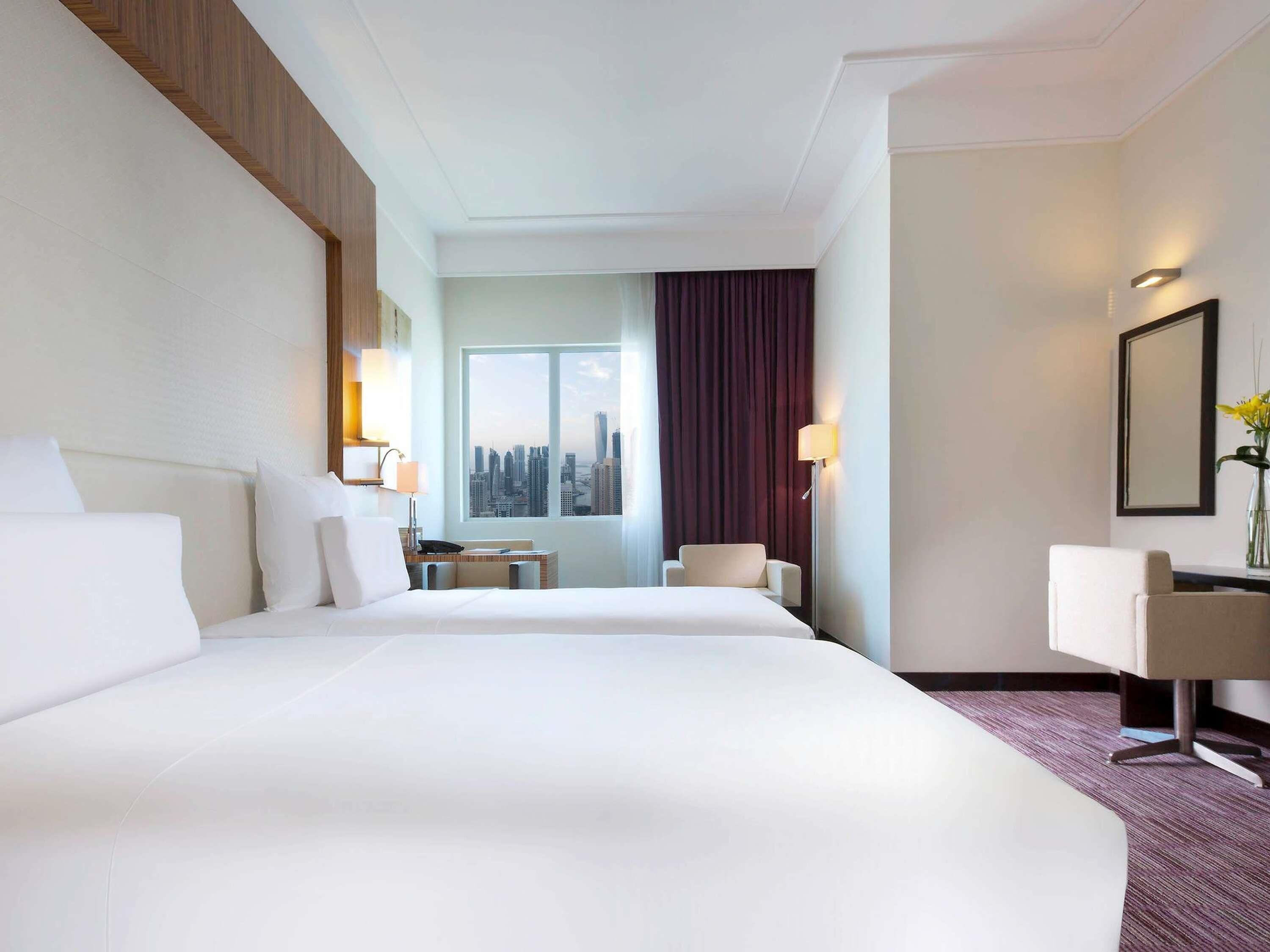 Premium bedding, pillow-top beds, minibar, in-room safe