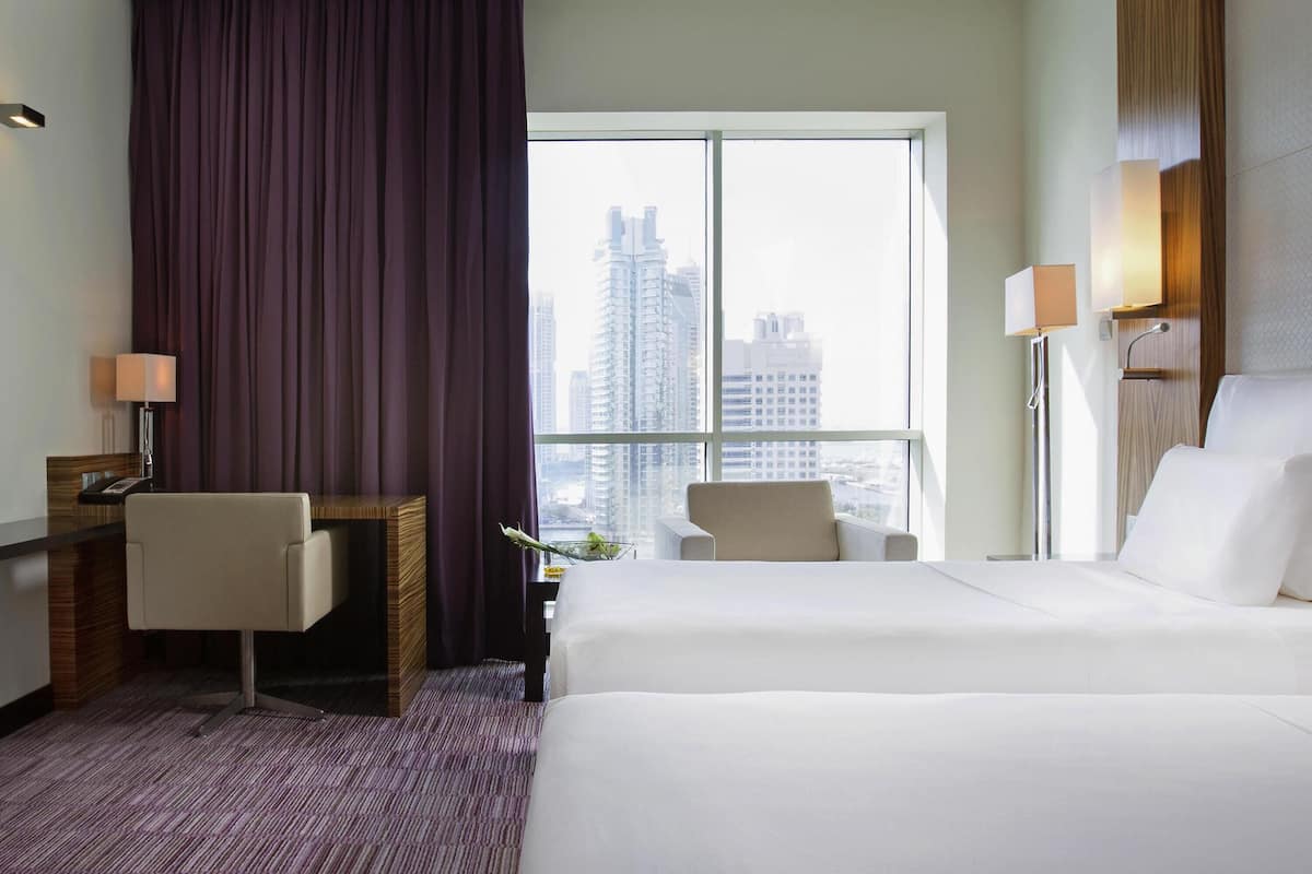 Premium bedding, pillow-top beds, minibar, in-room safe