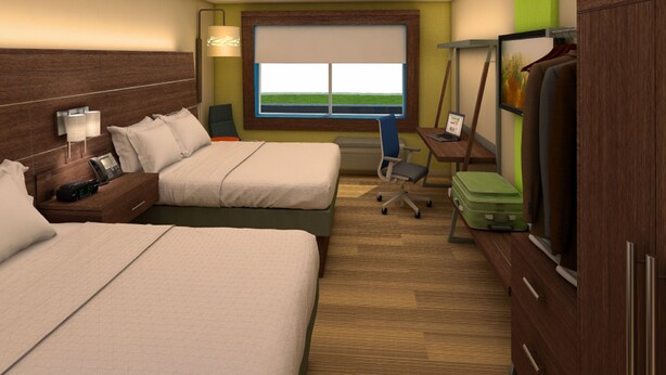 A hotel room with two beds, a desk, a chair, a TV, and a window with a view of the sky. - Holiday Inn Express & Suites Tulsa NE - Claremore by IHG (Claremore)