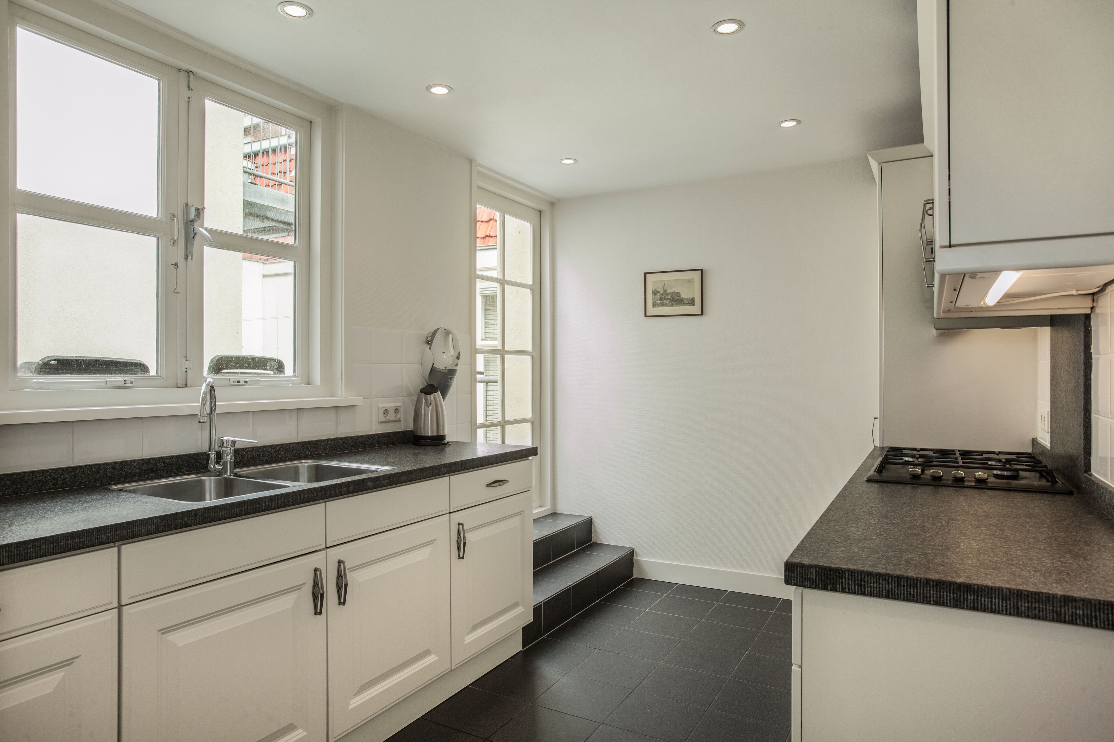 Appartement, 2 slaapkamers (spacious) | Privékeuken | Een koelkast, een magnetron, een kookplaat, een vaatwasser