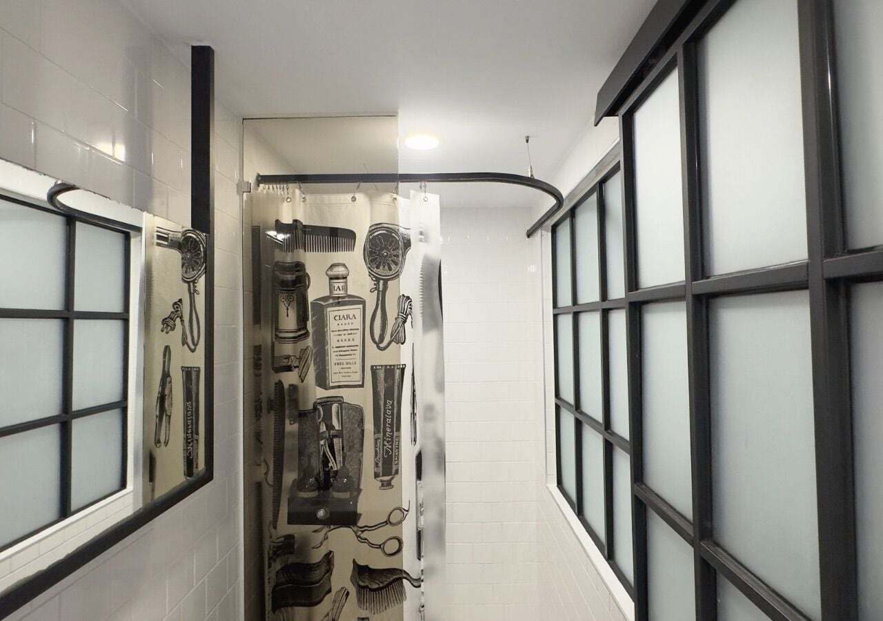 medium loft double, windowless  | bathroom | shower, hair dryer, towels