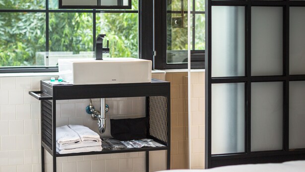 A modern bathroom with a large window, a sink, and a mirror. - Art'otel Ximending Taipei (Taipei)
