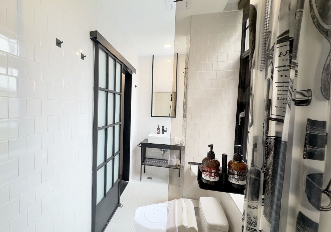 large family quadruple room (1 double bed and 1 twin bunk bed) | bathroom | shower, hair dryer, towels