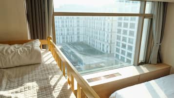 Family Room A (1Queen 150*200cm & 2Sinlge 110*200cm & 1bunk bed) | Blackout curtains, free WiFi