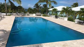Outdoor pool, pool umbrellas, sun loungers