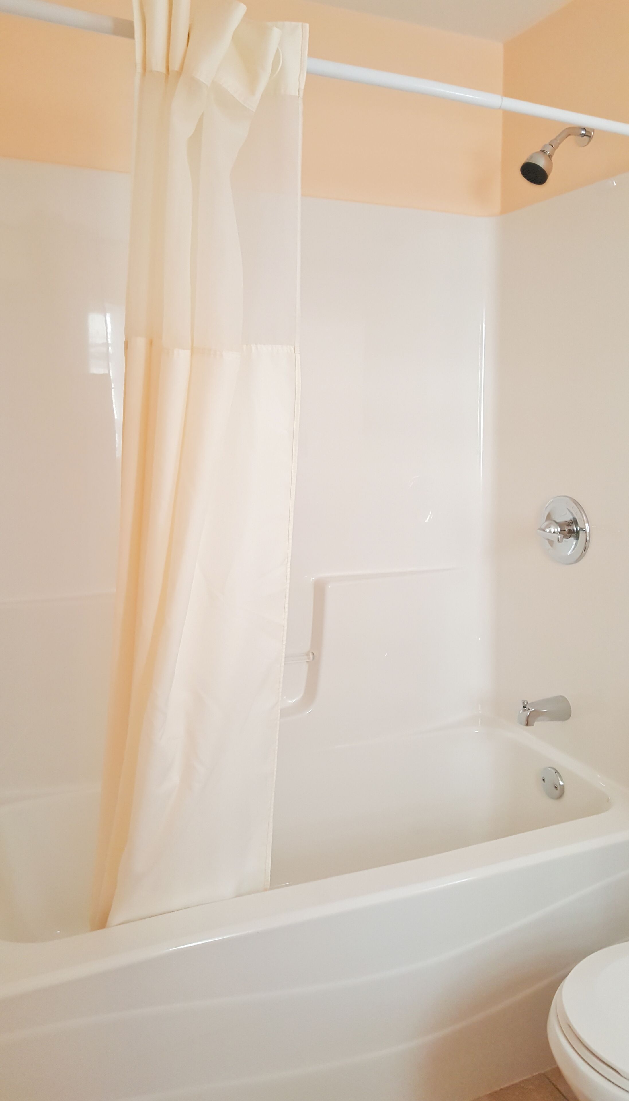 Classic Room, 2 Queen Beds | Bathroom | Combined shower/tub, free toiletries, hair dryer, towels