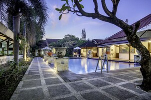 Outdoor pool, open 6:00 AM to 6:00 PM, pool umbrellas, pool loungers