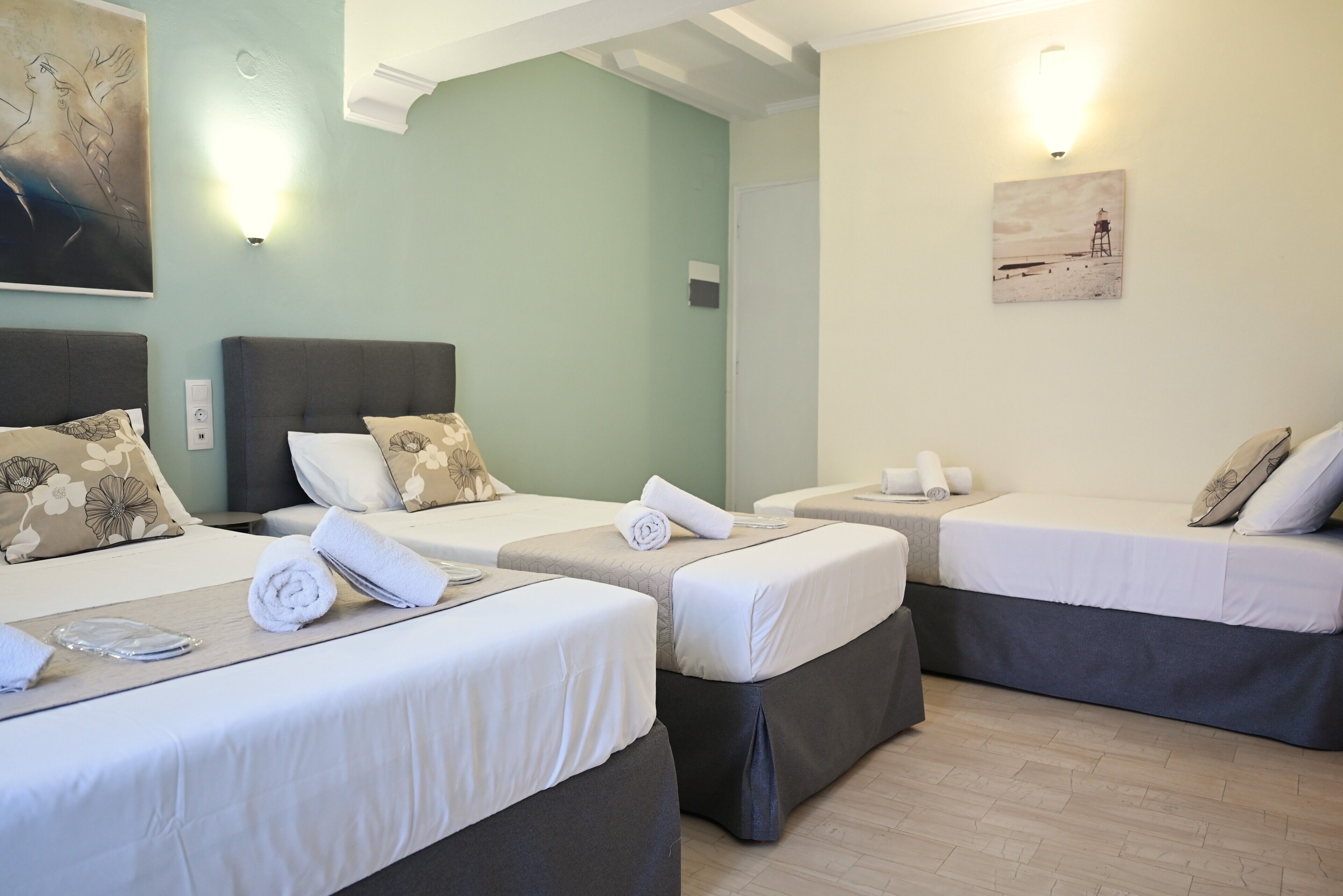 classic quadruple room | 1 bedroom, in-room safe, iron/ironing board, free wifi